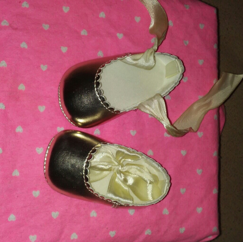 Gold infant slippers
